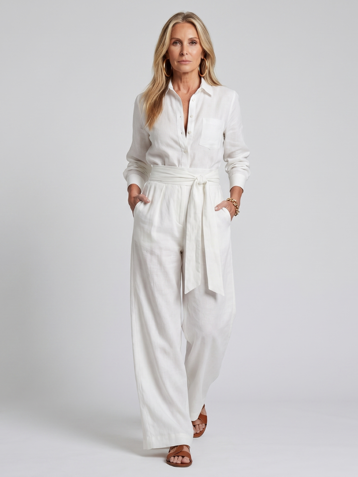 Jovie - Lange Mouw Knop Front Wijde Pijpen Jumpsuit