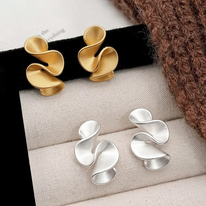 Earrings of Silver and 18K Gold